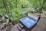 Look out over the river as you enjoy the hot tub